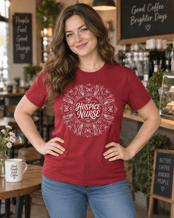 Hospice Nurse Shirt with mandala design featuring butterflies, feathers and caring hands, front view